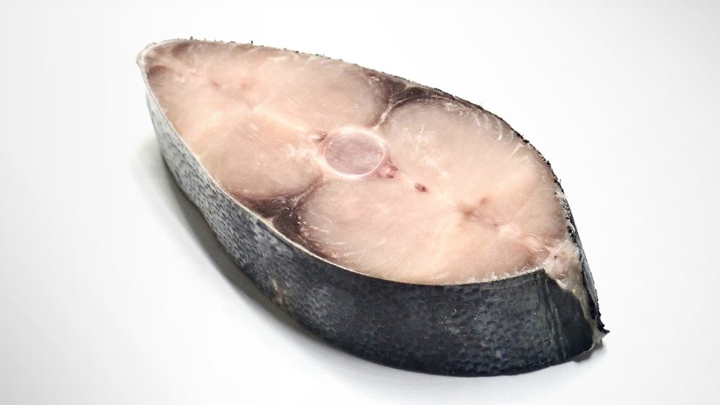 mahi mahi steak on white background