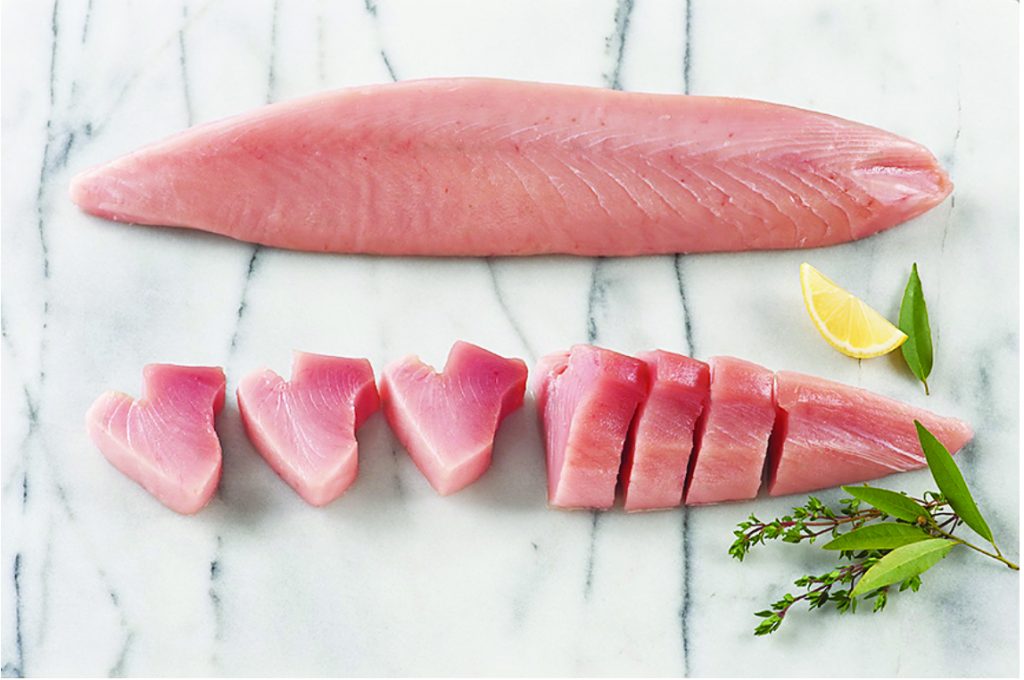 albacore loin and steak on marble background